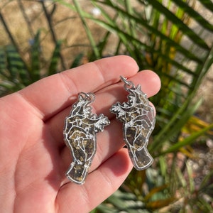 hand holding moon earrings | witchy moon earrings | witchy earrings | moon child