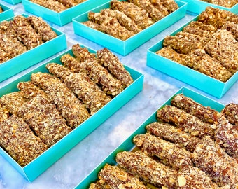 Sugar Free English Toffee Sticks Doused in Sugar Free Chocolate and Rolled in Toasted Almonds.