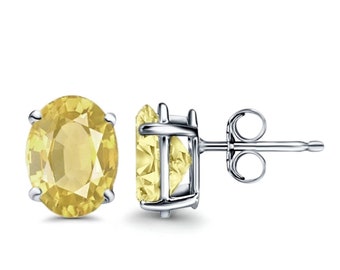 1.85 ct. Yellow Sapphire Oval Stud Earrings in 14k White Gold over Sterling Silver