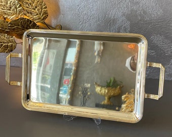 Gold color Serving Tray 42 x 27 cm (16.5 x 10.6 inches) Made of High Quality Brass and Silver plated. This serving tray is handmade.