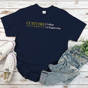 May include: A navy blue t-shirt with the text "CUSTOMS UNIVERSITY | College of Engineering" in yellow lettering.