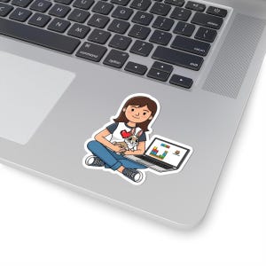 May include: A sticker featuring a cartoon illustration of a person sitting cross-legged, holding a rabbit with a heart, and a laptop. The laptop displays a game. The person wears a white shirt with a heart and blue jeans.