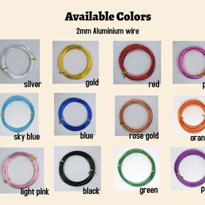 May include: A selection of 2mm aluminum wire in various colors, including silver, gold, red, pink, sky blue, blue, rose gold, orange, light pink, black, green, and purple.