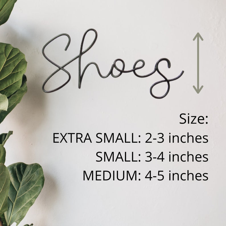 May include: Metal wall decor with the word "Shoes" in a cursive font. The sign is 2-3 inches tall when extra small, 3-4 inches tall when small, and 4-5 inches tall when medium.