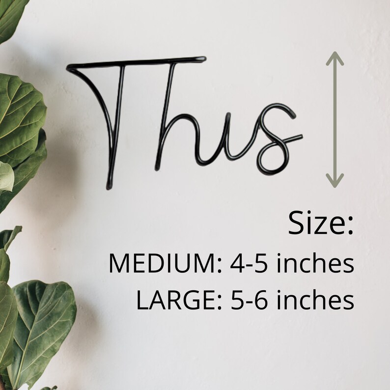 May include: Black metal word art that says "Thus" in a cursive font. The word art is shown with a ruler next to it to show the size options. The size options are: Medium: 4-5 inches and Large: 5-6 inches.