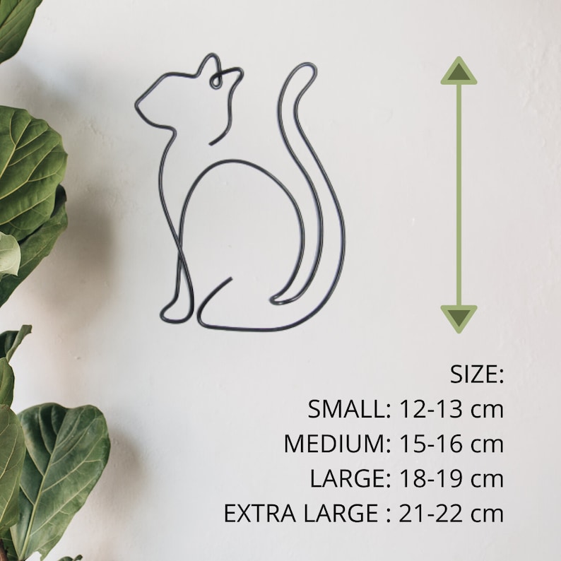 May include: Black metal wire cat sculpture in a sitting pose. The sculpture is available in four sizes: small (12-13 cm), medium (15-16 cm), large (18-19 cm), and extra large (21-22 cm).