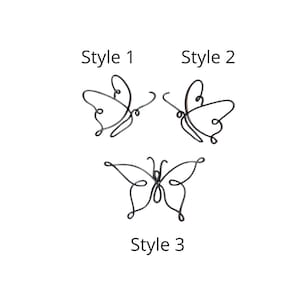 May include: Three different styles of metal butterfly wall decor. Style 1 and 2 are simple, while style 3 has more detail.