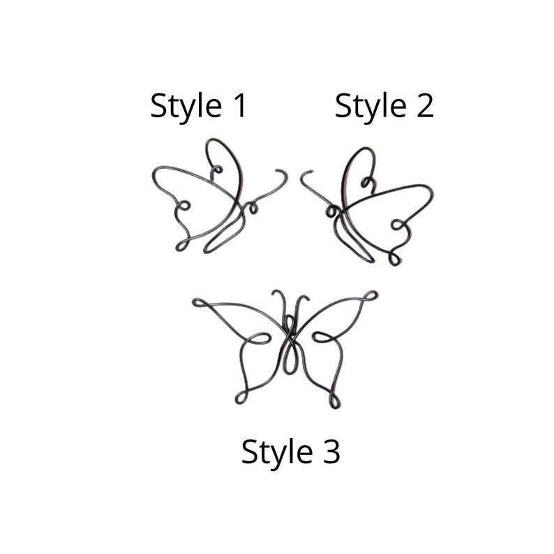 May include: Three different styles of metal butterfly wall decor. Style 1 and 2 are simple, while style 3 has more detail.