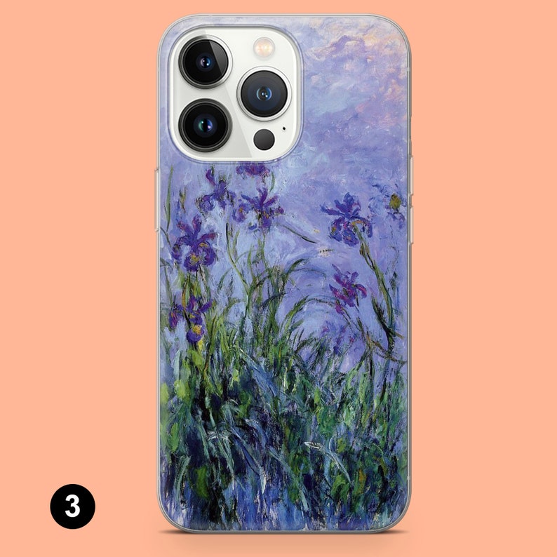 May include: A clear phone case with a painting of purple irises on a blue background. The case has a white camera bump with three black camera lenses.