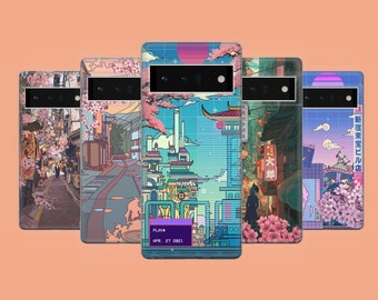 May include: Five phone cases with Japanese-inspired designs. Each case features a different cityscape scene with cherry blossoms, buildings, and a sunset. The cases are in shades of blue, pink, and orange.