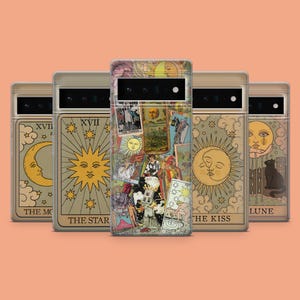 May include: Set of five phone cases featuring different tarot card designs. The designs include The Moon, The Star, The Lovers, The Kiss, and The Lune. Each case has a vintage aesthetic with gold accents and a beige background.