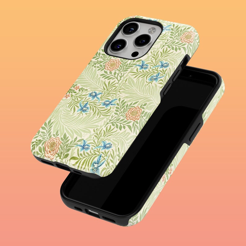 May include: A green and white phone case with a floral pattern. The case is designed for an iPhone and has a black camera bump.