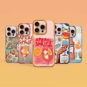 May include: Five different phone cases with colorful designs featuring the Aperol Spritz cocktail. The cases are all for the iPhone and have a variety of designs, including a glass of Aperol Spritz, a bottle of Aperol, and a slice of orange.
