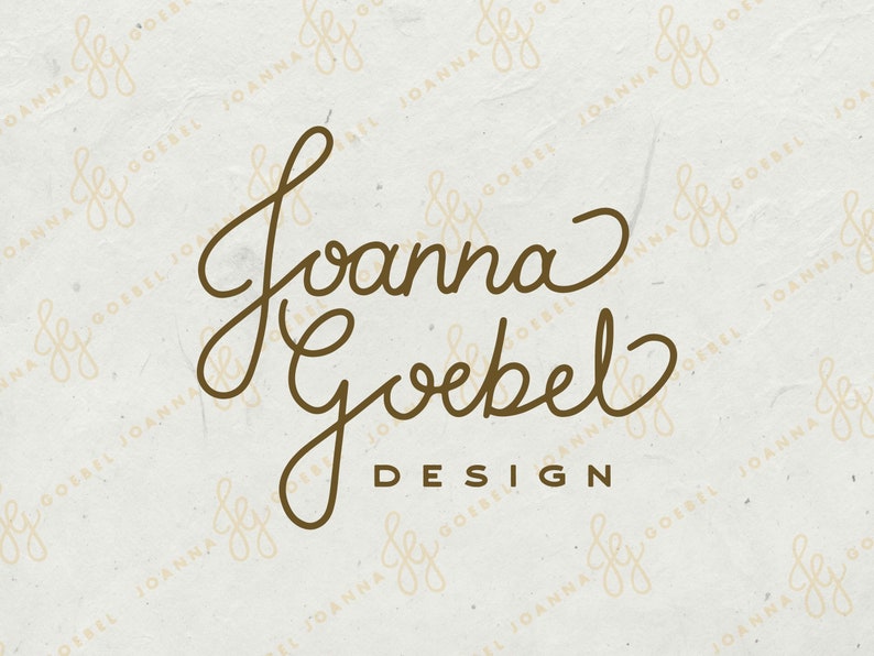 May include: A brown handwritten logo with the text "Joanna Goebel Design" on a white background.