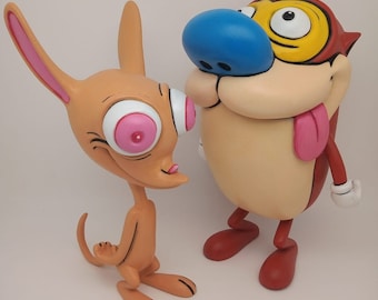 レン＆スティンピー　ぬいぐるみ　ラバーフェイス　アメコミ　baccan 好きにも Amazon.co.jp: Kidrobot Ren & Stimpy HugMe シェイクアクション