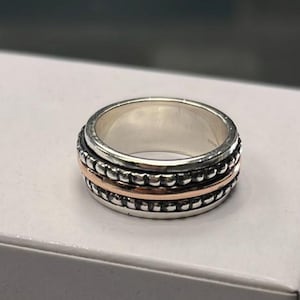 Silver And Rose Gold Spinner Ring