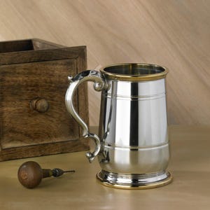 Polished Pewter Tankard With Brass Detailing