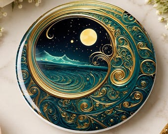 May include: A circular decorative coaster featuring a deep teal and gold swirling pattern. The center depicts a night sky with a yellow moon and stars above a dark landscape. The design is framed by intricate gold filigree and scrollwork.