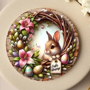 May include: A round Easter wreath featuring a brown bunny, pink lilies, and decorated eggs. The wreath is made of twigs and has a tag that says "Easter Blessings". The wreath is set on a beige plate.