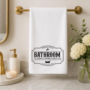 Toalla de mano para baño con diseño vintage, decoración fresca y limpia para el tocador.