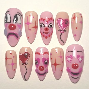 Whimsical Clown Press On Nails, Quirky Pink Circus Nail Art, Handmade Cartoon Clown Faces, Artistic Clown Face Nail Art, Gothic Nails