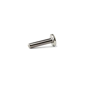 May include: A silver-colored, straight barbell-style body piercing stud. The stud has a flat, circular disc on one end and a rounded tip on the other. The barbell is made of a shiny, metallic material.
