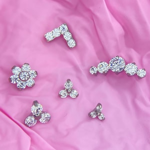 Kristallen titanium uiteinden, binnendraad 1,2 mm, tragus, helix, conch, platte piercings en meer.