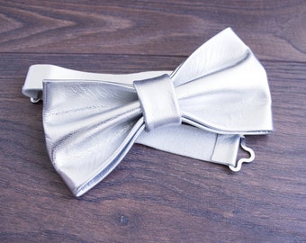 This handmade silver leather bow tie is not only high-quality but also stylish. Perfect for special occasions.Bow tie for men or women,
