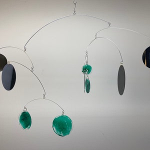 Modern Mobile,  Painted Lucite Discs in Black and Teal 2", 3" and 4" discs, 29"wide x 21" high