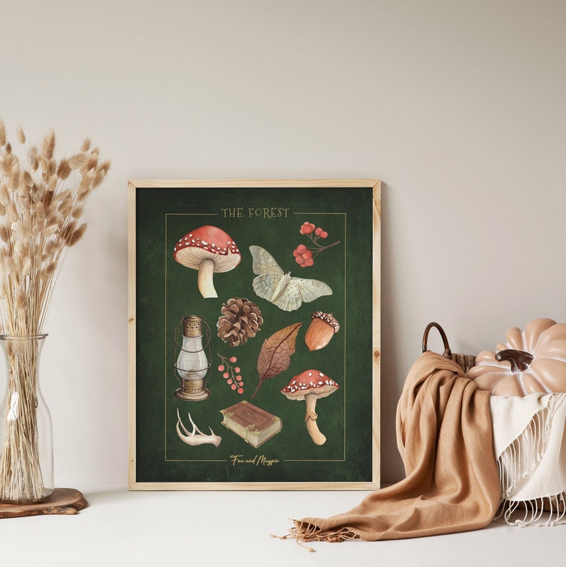 May include: A green poster with the text "THE FOREST" in gold lettering. The poster features illustrations of forest elements, including a red and white mushroom, a moth, a pine cone, a leaf, a lantern, berries, a book, and antlers. The text "Fairies and Magic" is at the bottom of the poster.