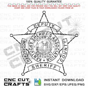 May include: Black and white illustration of a sheriff's badge with a five-pointed star. The badge features the text "DEPUTY SHERIFF'S ASSOCIATION MCCRACKEN COUNTY KENTUCKY SHERIFF".