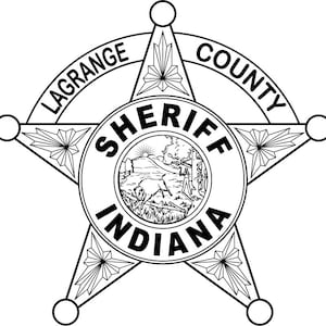 May include: Black and white illustration of a sheriff's badge with a five-pointed star. The star has the words "Lagrange County" on the outer rim and "Sheriff Indiana" in the center.