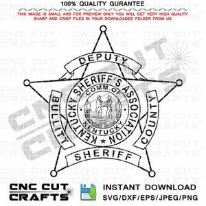 May include: Black and white illustration of a sheriff's badge with a five-pointed star. The badge features the text "Deputy Sheriff's Association Bullitt County Kentucky" and a small image of the Kentucky state seal.