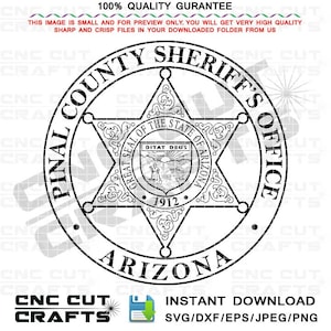 May include: Black and white illustration of a sheriff's badge with a five-pointed star and the text "Pinal County Sheriff's Office Arizona" around the star. The star contains the seal of the state of Arizona with the text "Great Seal of the State of Arizona" and "Ditat Deus" inside the seal.