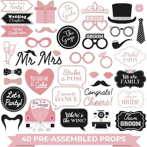 May include: A collection of 40 pre-assembled photo booth props in pink, black, and white. Includes speech bubbles, mustaches, glasses, and signs with phrases like "Bride," "Groom," and "Let's Party!" Ideal for weddings and parties.