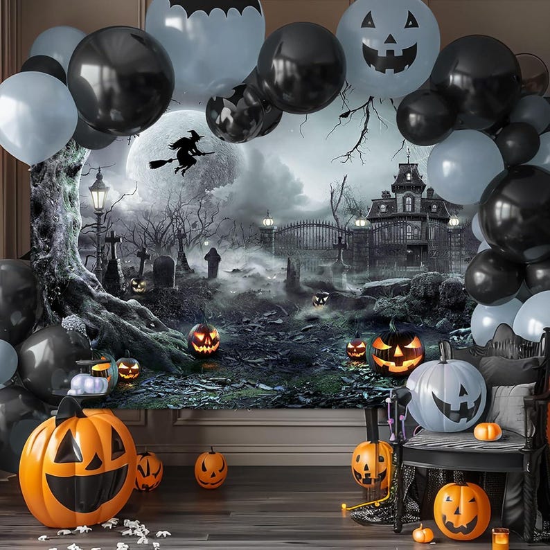 May include: A Halloween-themed party scene with black, gray, and orange balloons, a backdrop of a haunted house, and jack-o'-lanterns. The scene includes a witch flying across a full moon, creating a spooky atmosphere.