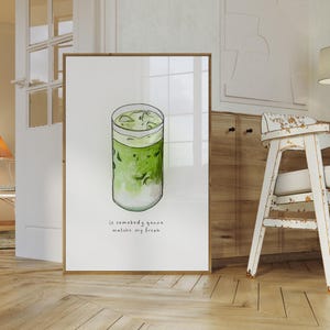 May include: A watercolour illustration of a glass of iced matcha with the text "is somebody gonna matcha my freak" underneath.