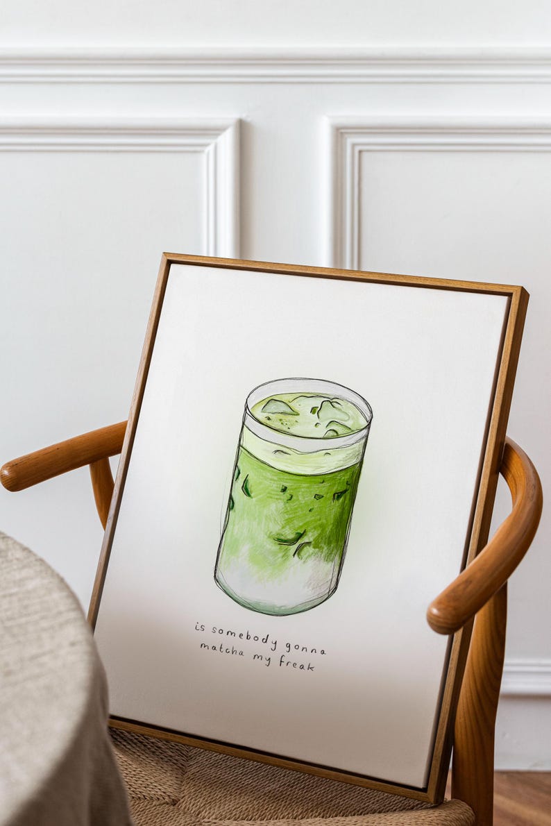 May include: A framed illustration of a glass of iced matcha with the text "is somebody gonna matcha my freak" underneath.