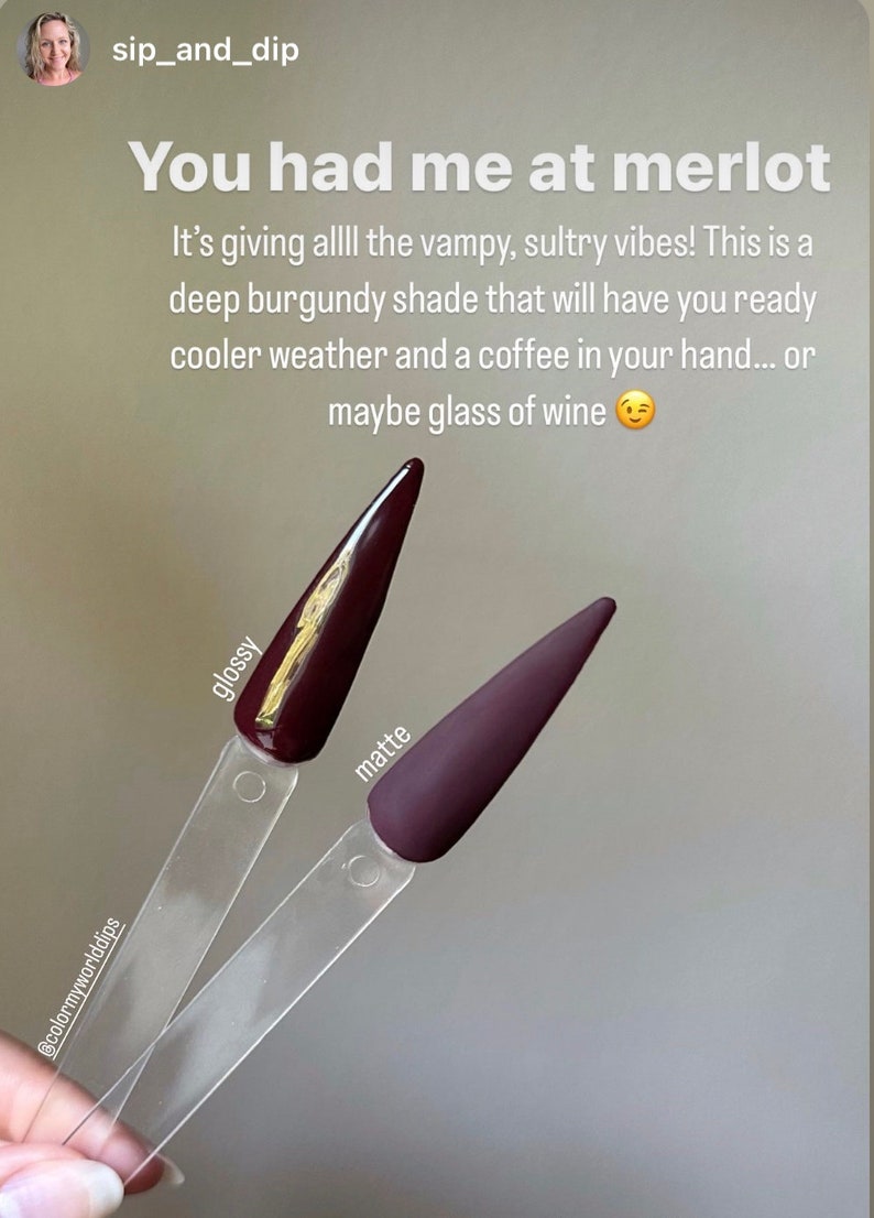 May include: Two nail polish swatches, one glossy and one matte, in a deep burgundy shade. The glossy swatch has a gold shimmer. The text "glossy" and "matte" are written on the swatches.