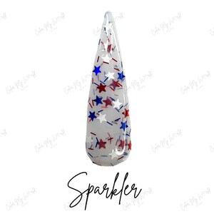 May include: A clear nail tip filled with red, white, and blue star-shaped glitter and small lines. The word "Sparkler" is written in a cursive font at the bottom of the image.