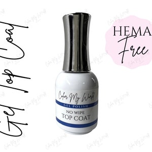 May include: A clear bottle of Color My World gel polish top coat. The bottle has a silver cap and a white label with blue text that reads "Color My World Gel Polish No Wipe Top Coat". The bottle is labeled "HEMA Free".