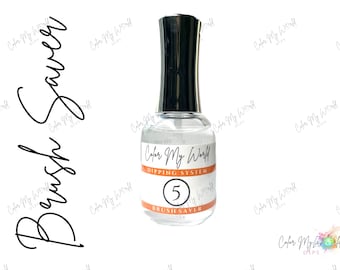 May include: A clear glass bottle with a black cap and a white label. The label says "Color My World Dipping System" and "Brush Saver". The number "5" is on the label.