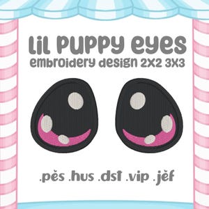 May include: Black embroidered puppy eyes design with white highlights and pink accents. The text "lil puppy eyes embroidery design 2x2 3x3" is displayed above the eyes. Below the eyes are the file types .pes .hus .dst .vip .jef.