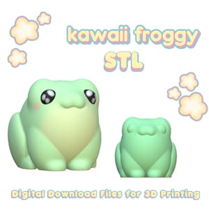 Puede incluir: Dos figuritas de rana verde impresas en 3D con ojos grandes y estilo kawaii. La rana más grande está sentada con las patas metidas debajo del cuerpo. La rana más pequeña está de pie con las patas separadas. El texto "kawaii froggy STL" está escrito en colores arcoíris sobre las ranas.