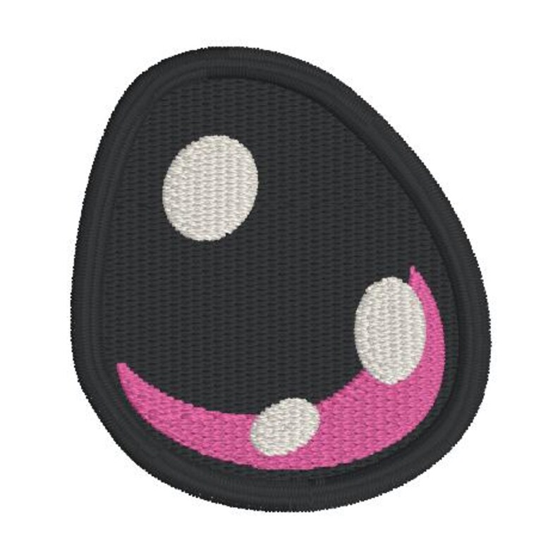 May include: Embroidered patch featuring a stylized cartoon eye. The patch has a black background with a white dot and a pink curved shape with two white dots, creating a smiling expression. The patch has a black border.