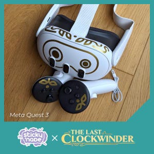 May include: White Meta Quest 3 virtual reality headset with gold accents and a custom design featuring the text "The Last Clockwinder". The headset is paired with two white controllers with black buttons and gold accents.