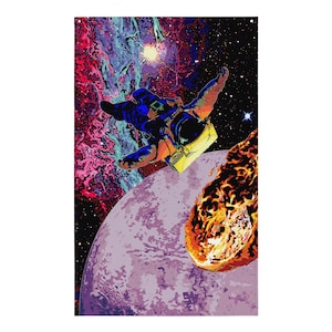 May include: A vibrant, colorful print depicting an astronaut floating in space. The artwork features a purple planet, a fiery meteor, and a swirling nebula in shades of red, blue, and purple. The astronaut is wearing a blue and yellow spacesuit.
