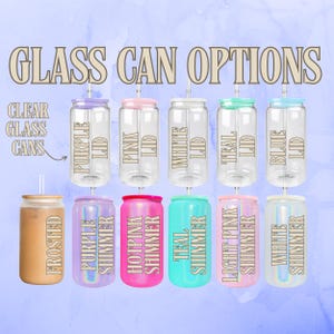 May include: A selection of glass can tumblers with different colored lids and shimmer finishes. The colors include purple, pink, teal, light pink, and white. The text "GLASS CAN OPTIONS" is at the top of the image.
