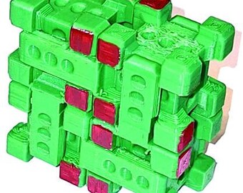 C-Bin a cubino(R) snap action puzzle