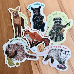 May include: A handmade wooden sign with the text "Welcome" in a playful font. The sign is painted white with a distressed finish, and features a small, decorative heart. Perfect for adding a touch of rustic charm to any home.